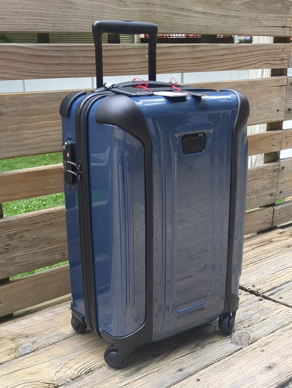 TUMI Hardshell Carry-On 22" Roller in Metallic Navy Blue/Black